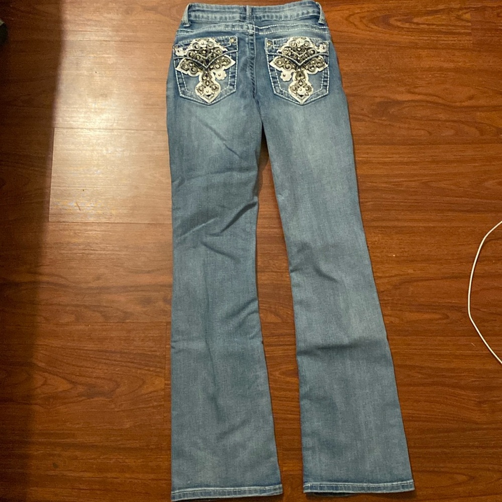 flare jeans with back pocket design